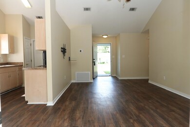 view of living room from back of house