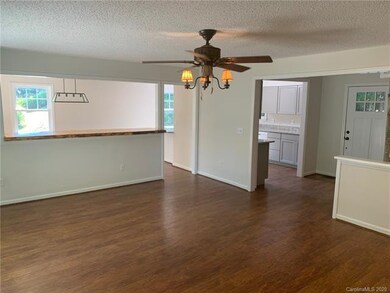 View from great room into dining and kitchen