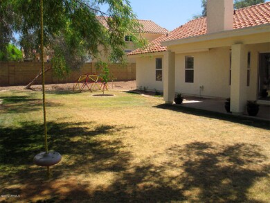 Spacious Backyard with Grass Play Area