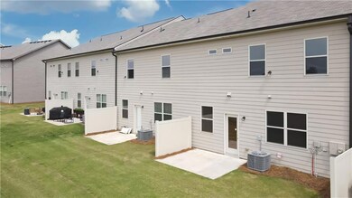 Back of property featuring a patio area and centra