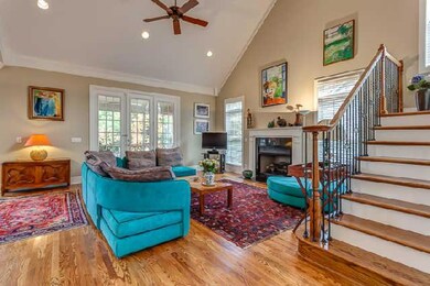 Gorgeous hardwoods, gas log fireplace, abundant windows....this family room will be one of your favorite rooms!