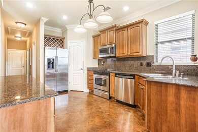 Built-in buffet and wine rack above refrigerator.