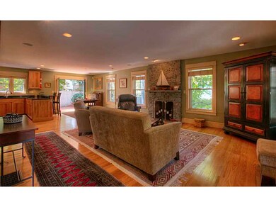 Living Room. Hardwood floors, stone fireplace,  op