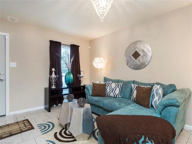 Large window in living room gives the space a lighter feel!