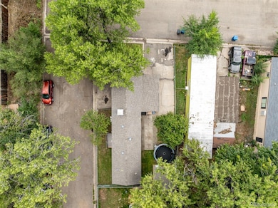 Aerial view of the corner lot with neighboring trail and creek!