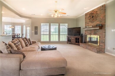 Large living room with wood-burning fireplace