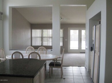 Family room w/ outdoor access to pool