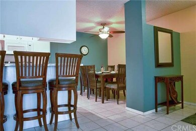 Dining area and ceiling fan and light fixture