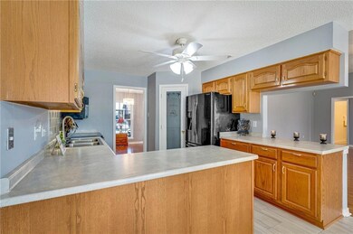 Additional view of kitchen with plenty of counters