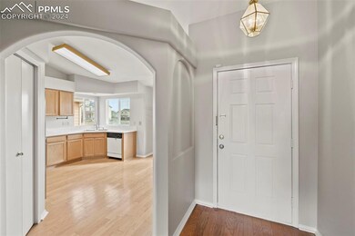 Foyer entrance featuring light wood-type flooring 