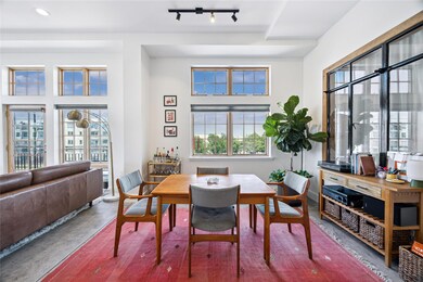 Dining space featuring finished concrete flooring