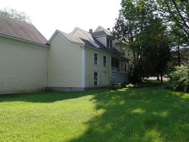 rear view of barn, back porch and...