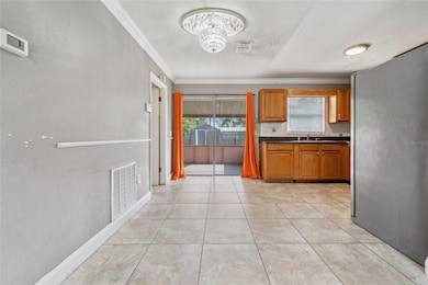 Sliding Doors leading out to back enclosed porch.