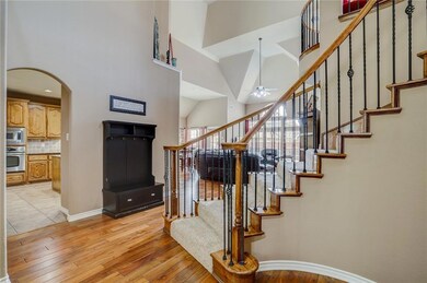 Curved Staircase with Romeo and Juliette Balcony