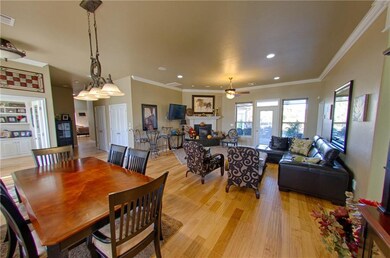 living area with formal dining space.  fireplace w