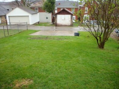 OFF STREET REAR CONCRETE PARKING PAD ALLEY ACCESS