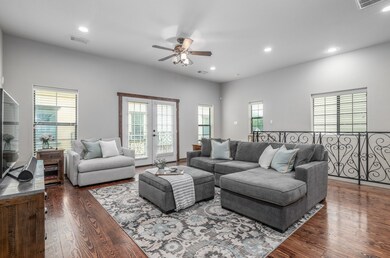 The exotic wide-plank, wood floors and wood framed