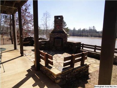 Outdoor fireplace with built in seating.