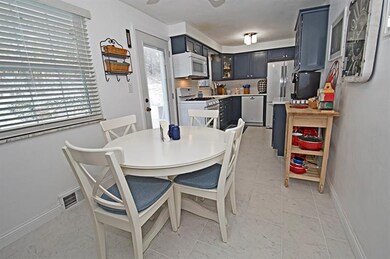 ENJOY MEALS IN THIS SUNSHINY AREA! THE LARGE WINDO