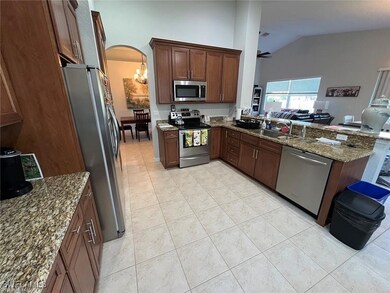 Kitchen with appliances with stainless steel finis