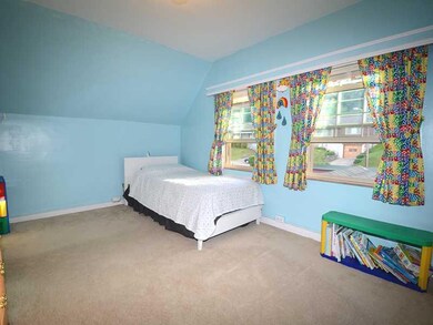Bedroom. Large second bedroom. Hardwood under the 