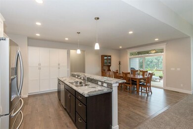 Kitchen dining area and deck beyond