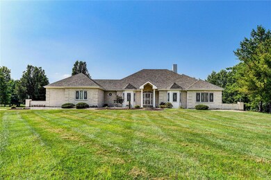 Beautiful atrium ranch on 3 level acres!