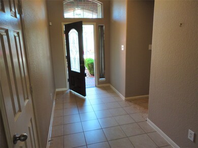 Nice tile entry and notice leaded glass door