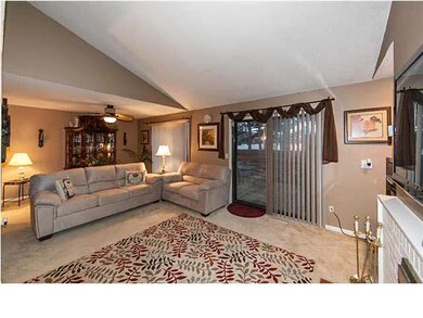 Living room with sliding doors leading to deck