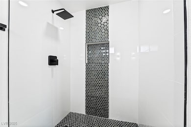 Bathroom with a tile shower
