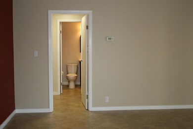 Powder room adjacent to laundry room