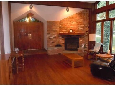 Family Room. A fantastic corner brick gas fireplac
