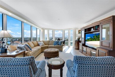 Living room featuring light tile patterned floors,