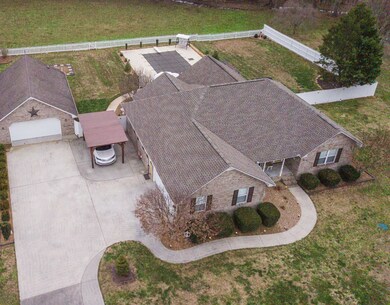 This home is a dream: 2-car (22'x21') attached garage, oversized (31'x23') detached garage, custom carport, heated (16'x32') in-ground salt water pool.