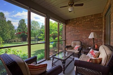 Screened porch for enjoying company or unwinding to peaceful southern Williamson county.