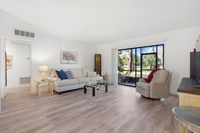 Living area with light wood-style flooring