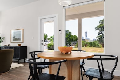 Dining space featuring wood finished floors