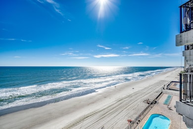 View of water feature with a southern view of the beach and Garden City Pier.