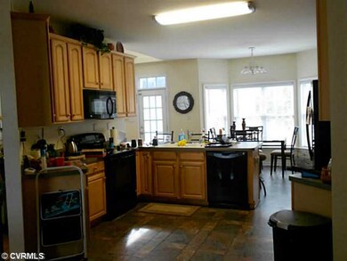 Kitchen - View of kitchen (sorry so dark) showing the spacious area to work in .