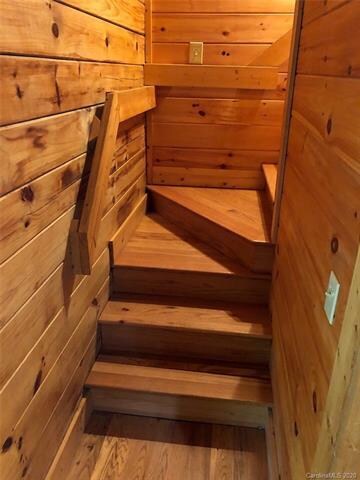 Stairs lead to additional sleeping area in the 2/2