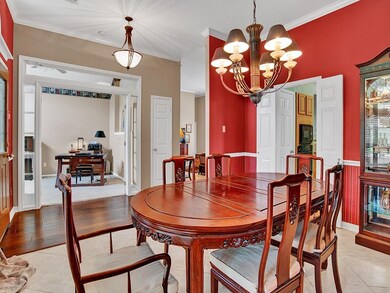 Formal dining room is also off the foyer, and has 