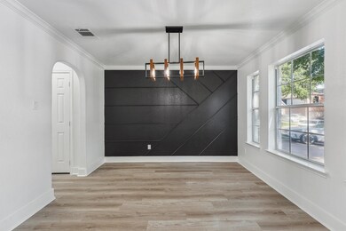 The formal dining room is perfectly sized for gath