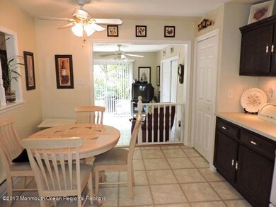 Kitchen open to Sunroom