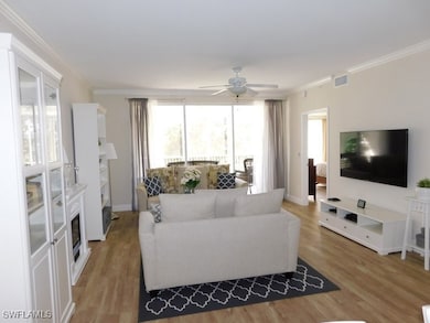 7655 Pebble Creek Cir unit 302, Naples, FL 34108 - photo 2