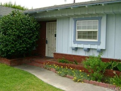 Exterior view of the kitchen window and front door