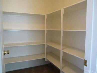 Walk-in linen closet.