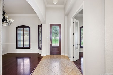 Entry, formal dining on one side w/study on other 