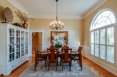 Formal Dining Room, Crown Molding, Arched Transom, Hardwoods