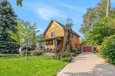 Home and brick driveway in the summer