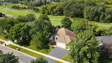 Aerial view of the home with view of 9th hole of Crystal Lake Golf Course in Lakeville!